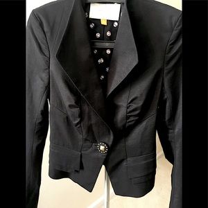 Tuxedo jacket w/ruched tucked design layered peplum effect & a sculpted button